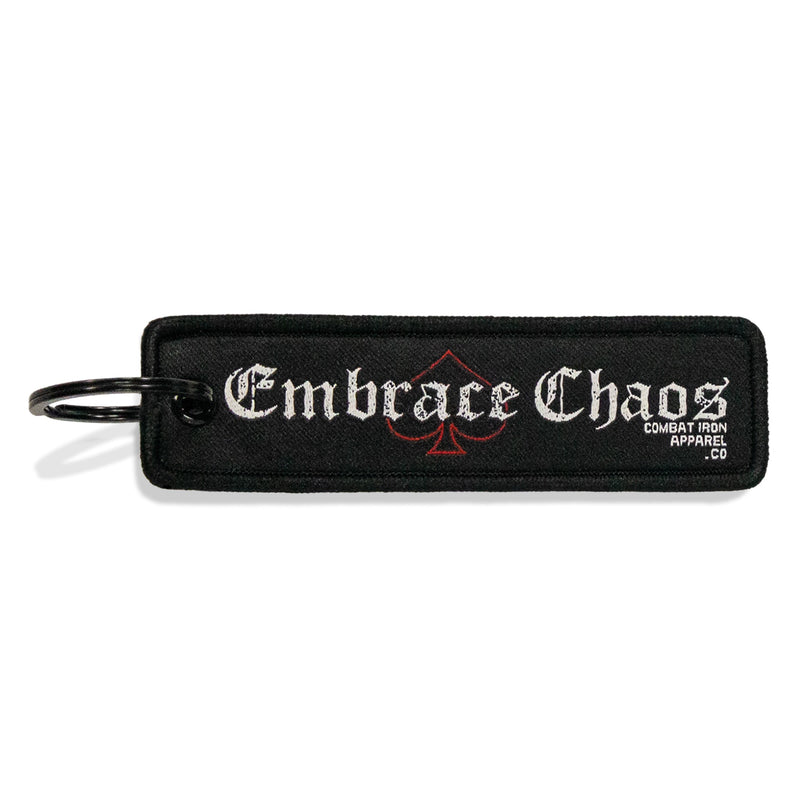 Load image into Gallery viewer, Embrace Chaos Flight Tag Keychain

