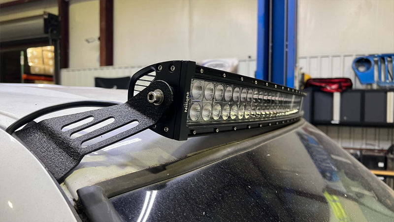Load image into Gallery viewer, Fishbone Offroad Roof Light Bar Bracket for 1999-2006 GM Pickups FB21354
