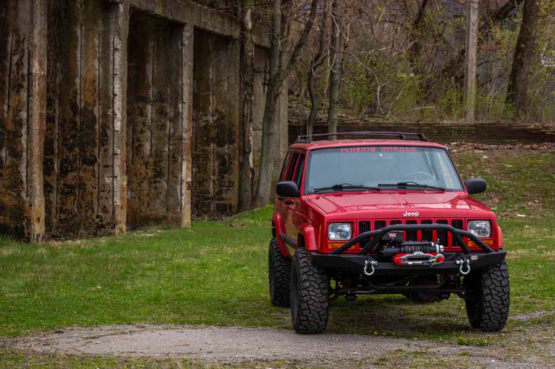 Load image into Gallery viewer, Fishbone Offroad Bullhead Front Winch Bumper with Grille Guard for 1984-2001 Jeep Cherokee FB22060
