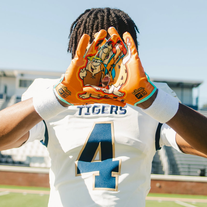 Load image into Gallery viewer, The Flintstones "Bedrock Blitz" Football Gloves - VPS5 by Phenom Elite
