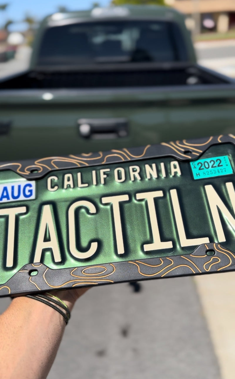 Load image into Gallery viewer, Two-Tone Silicone Topographic License Plate Frame - Anti-Rattle, Anti-Scratch Plate Wrap
