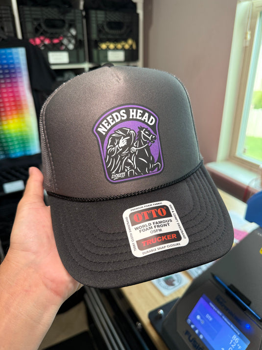 Needs Head Trucker Hat