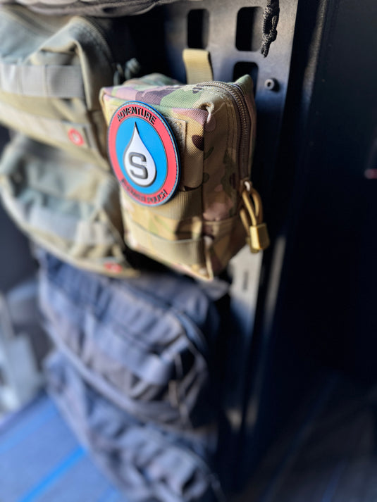 Tactical Molle Zipper Bag + Adventure Sampler Kit: 4 Shower Pouches, 1 Hand Sanitizer (80%), and 1 Deodorant