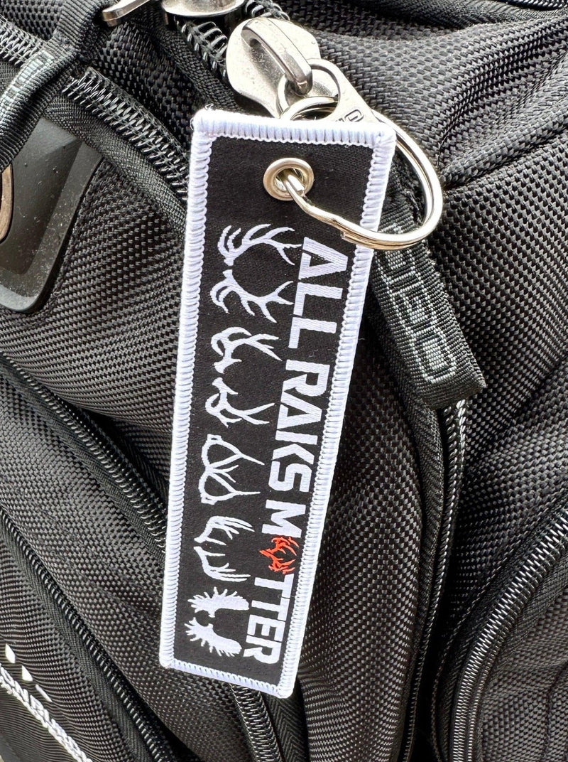 Load image into Gallery viewer, All Raks Matter ™ Key Ring Luggage Pull
