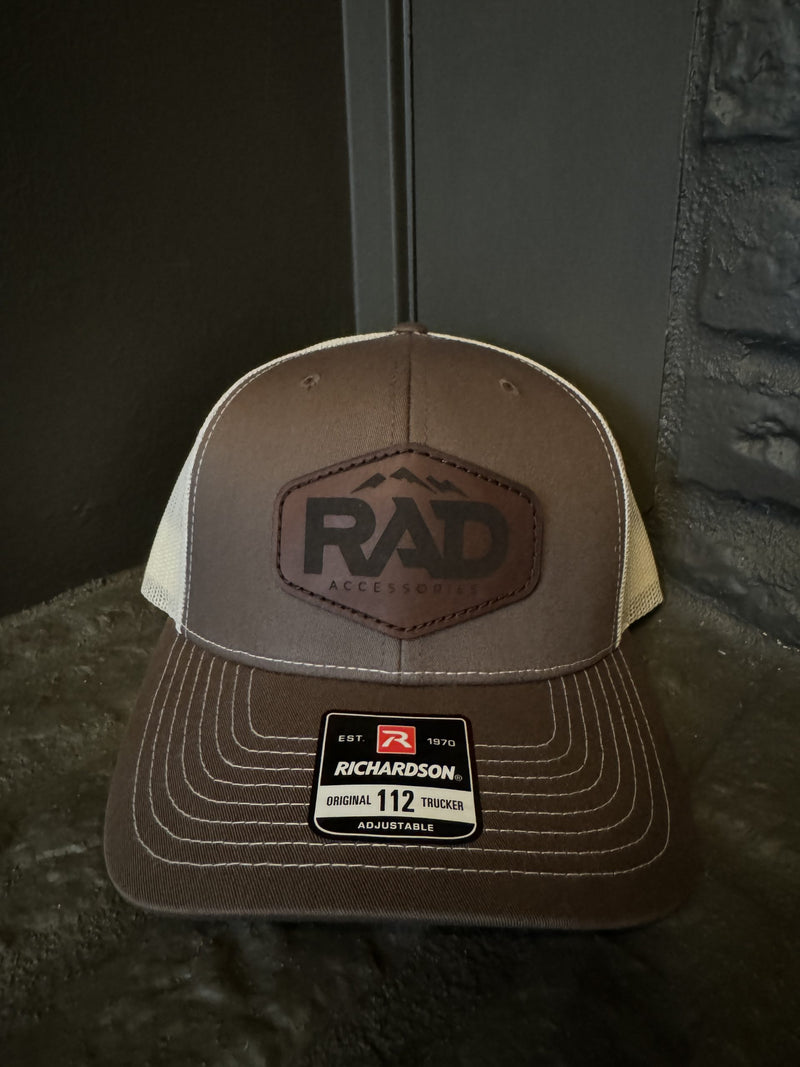 Load image into Gallery viewer, Rad Accessories Snap Back Leather Patch Trucker Hat Chocolate Chip &amp; Birch
