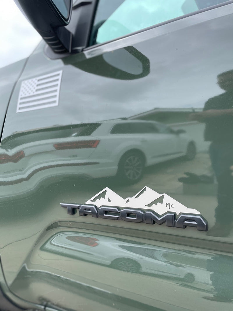 Load image into Gallery viewer, Toyota Tacoma Badge Mountain Range Magnet (2016+)
