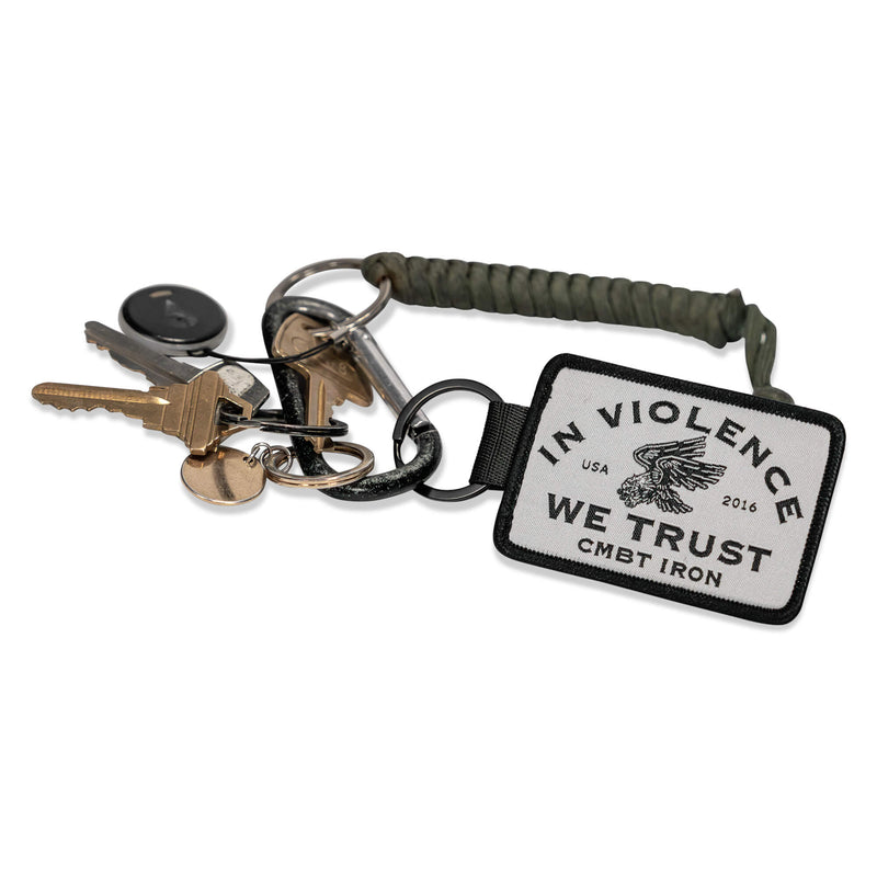 Load image into Gallery viewer, In Violence We Trust Flight Tag Keychain
