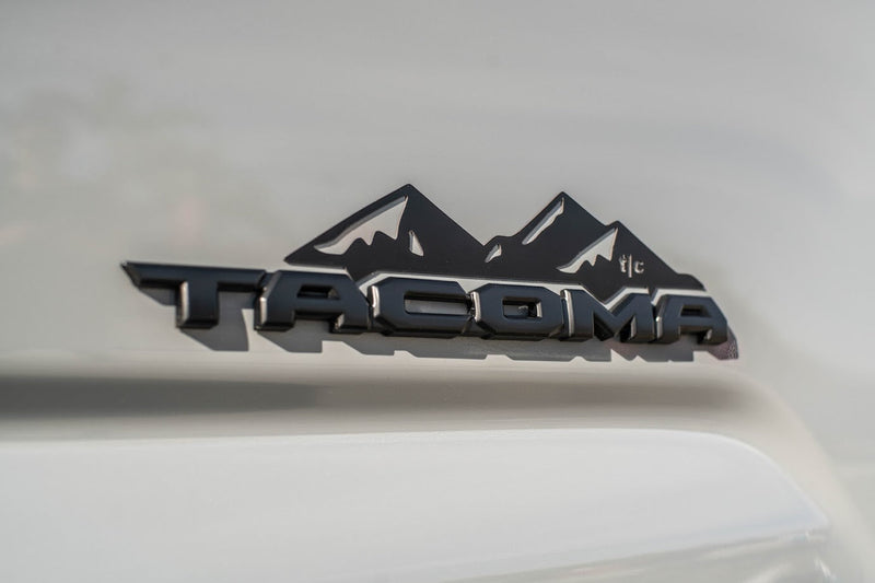 Load image into Gallery viewer, Toyota Tacoma Badge Mountain Range Magnet (2016+)
