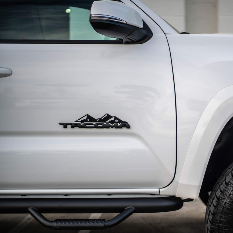 Load image into Gallery viewer, Toyota Tacoma Badge Mountain Range Magnet (2016+)
