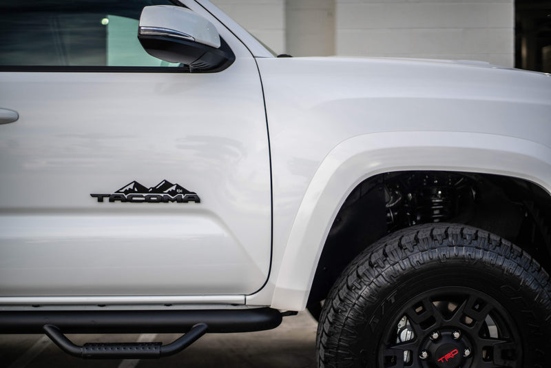 Load image into Gallery viewer, Toyota Tacoma Badge Mountain Range Magnet (2016+)

