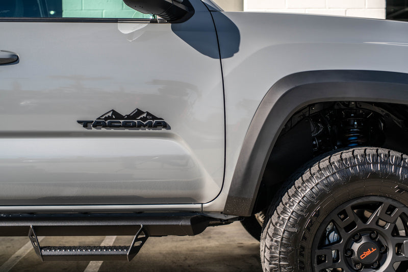 Load image into Gallery viewer, Toyota Tacoma Badge Mountain Range Magnet (2016+)
