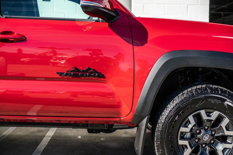 Load image into Gallery viewer, Toyota Tacoma Badge Mountain Range Magnet (2016+)
