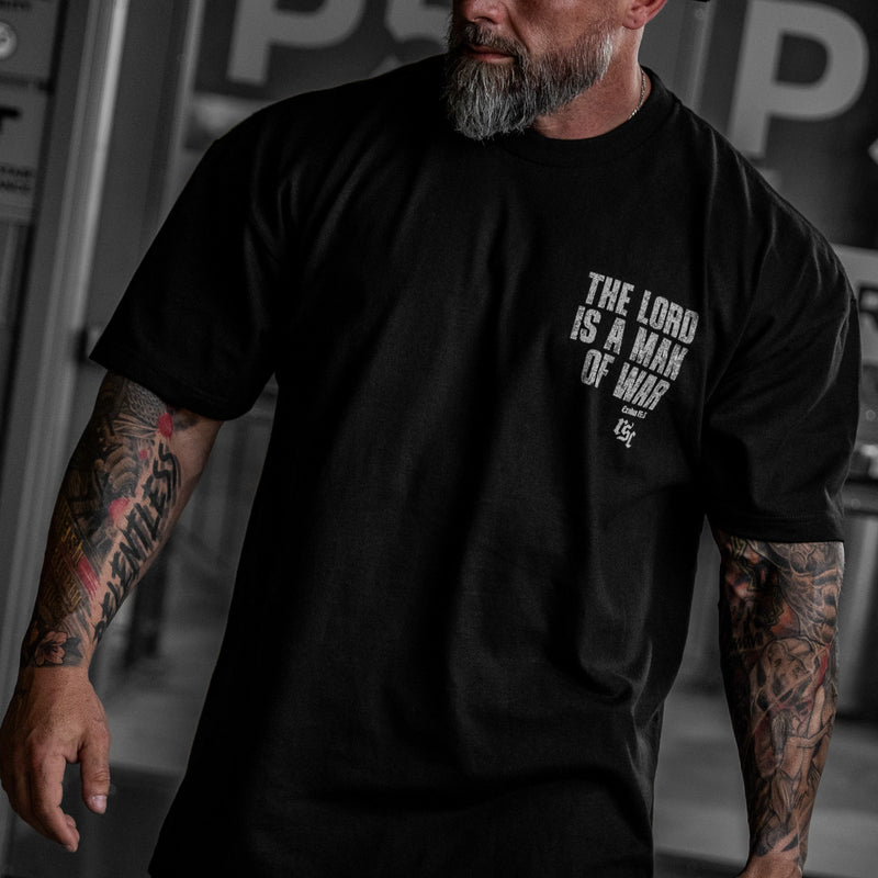 Load image into Gallery viewer, The Lord Is A Man Of War Heavyweight Men's T-Shirt
