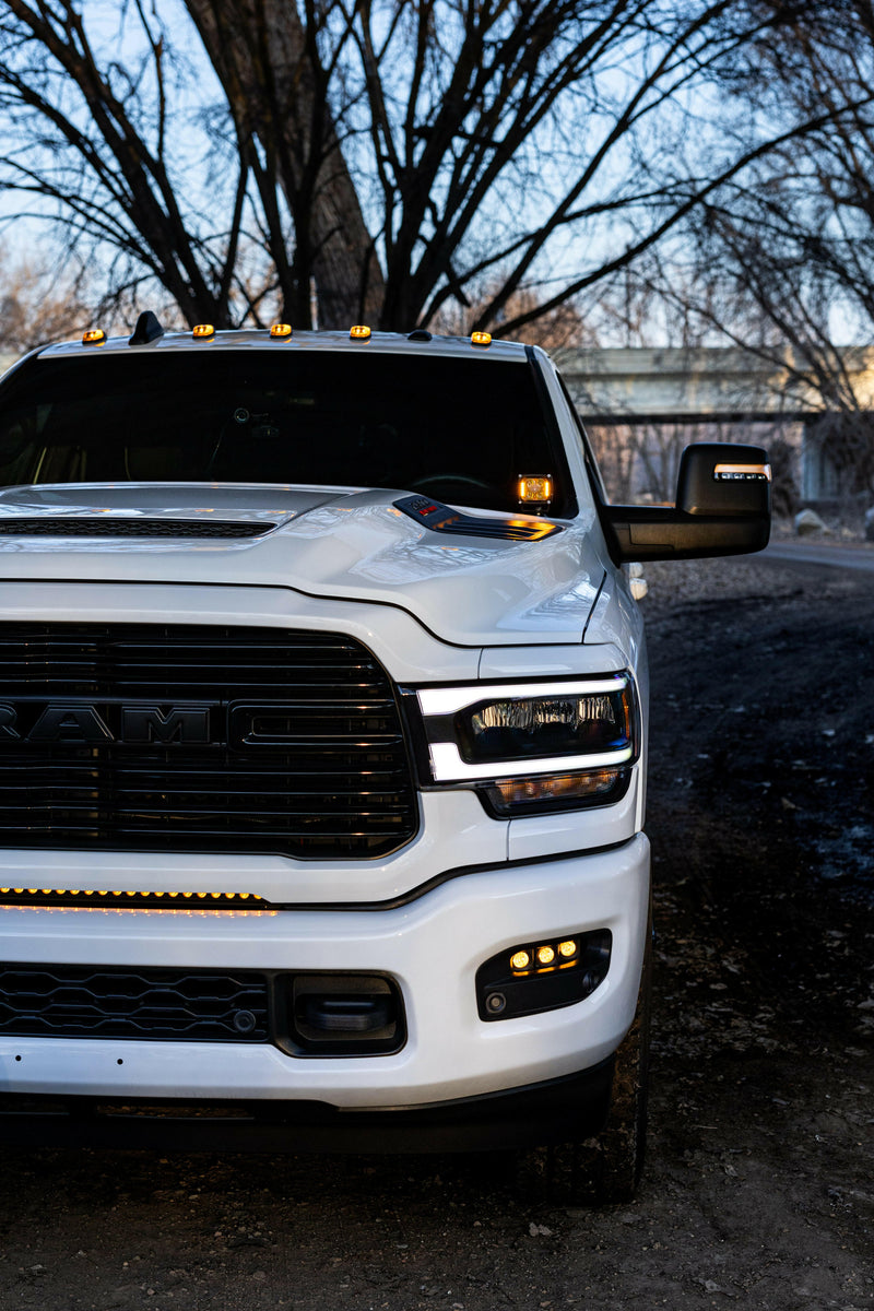 Load image into Gallery viewer, 2019-2024 RAM 2500/3500 Hood Mount/Ditch Lights
