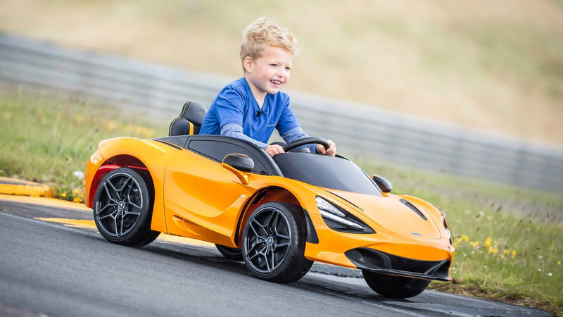 Load image into Gallery viewer, McLaren Ride On Car Toy For Children W/Magic Cars® Wireless Parental Control
