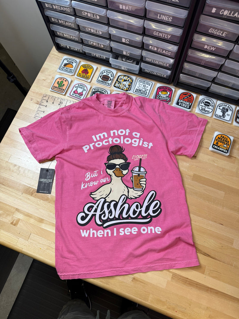 Load image into Gallery viewer, Not A Proctologist Tee
