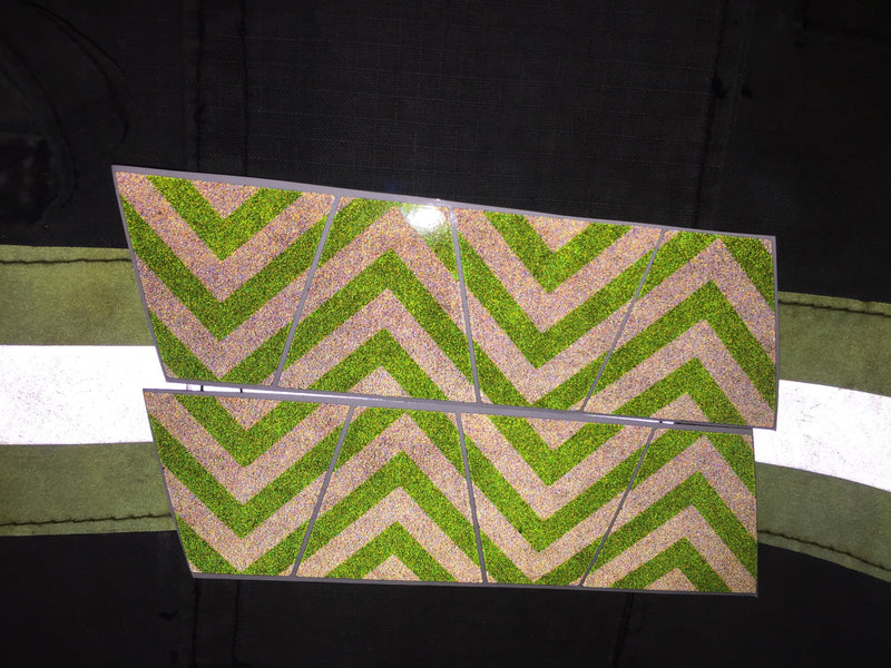 Load image into Gallery viewer, BLACKED OUT BLACK AND GREEN CHEVRON REFLECTIVE HELMET (TET) TETRAHEDRON 8 PACK
