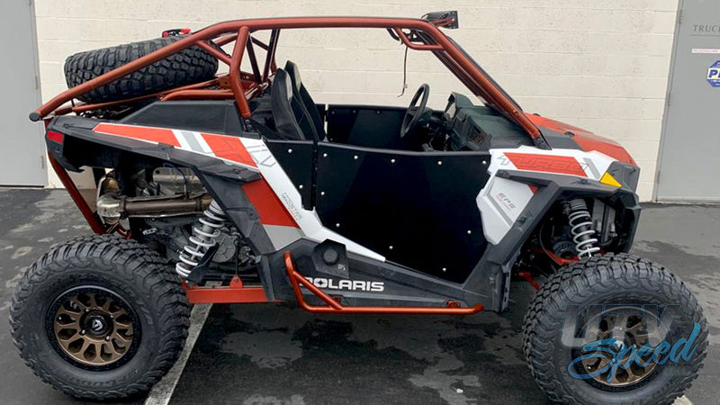 Load image into Gallery viewer, Opening Spare Tire Mount with shocks for the Polaris RZR 1000 by UTV Speed
