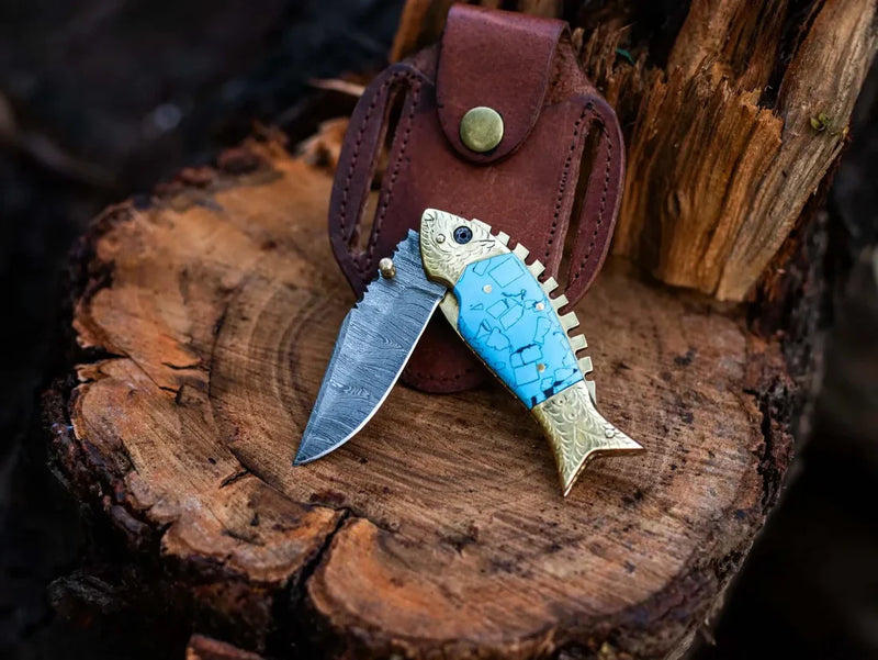 Load image into Gallery viewer, Custom Handmade Fish Style Damascus Steel Folding Knife with Epoxy Resin Handle &amp; Brass Accents - Includes Leather Sheath
