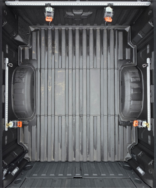 Truck bed tie down system