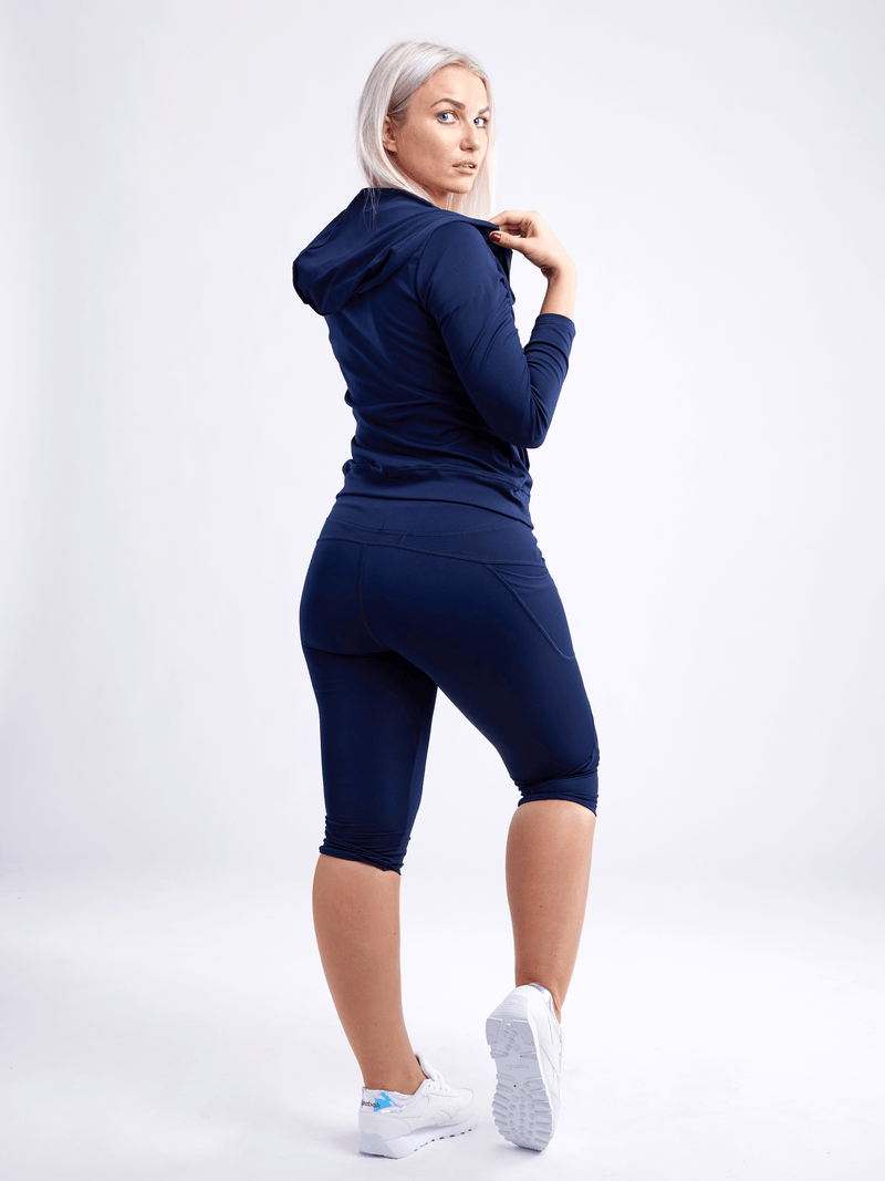 Load image into Gallery viewer, JupiterGear Mid-Rise Capri Fitness Leggings with Side Pockets
