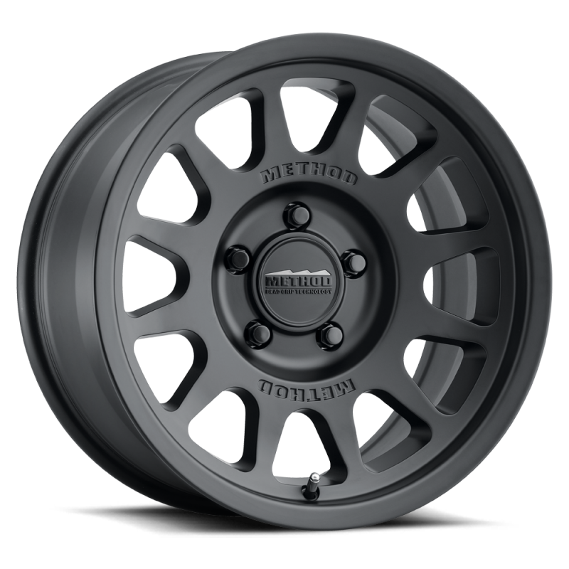 Load image into Gallery viewer, Method MR703 15x7 +15mm Offset 5x100 56.1mm CB Matte Black Wheel

