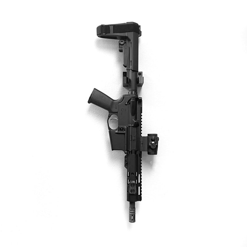 Load image into Gallery viewer, AR-15 Buffer Tube Wall Storage Mount
