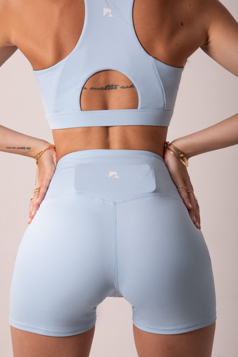 Load image into Gallery viewer, Women's Sculpting Workout Shorts 5 Inch - Baby Blue | Criss-Cross Waistband with Pocket
