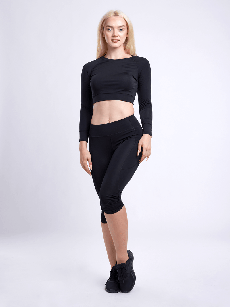Load image into Gallery viewer, JupiterGear Mid-Rise Capri Fitness Leggings with Side Pockets
