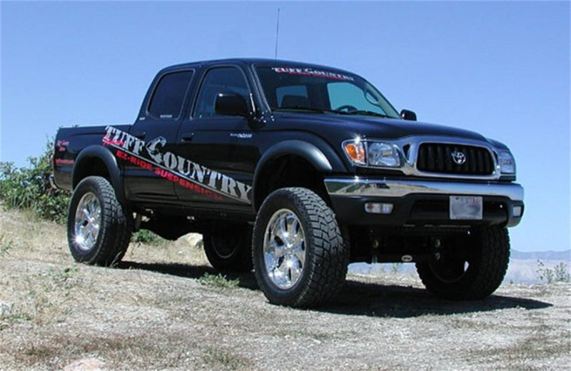 Load image into Gallery viewer, Tuff Country 95-04 Toyota Tacoma 4x4 &amp; PreRunner 5in Lift Kit (SX8000 Shocks)
