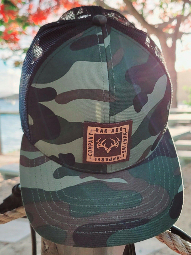 Load image into Gallery viewer, Delta Camo Leather Patch Trucker Hat

