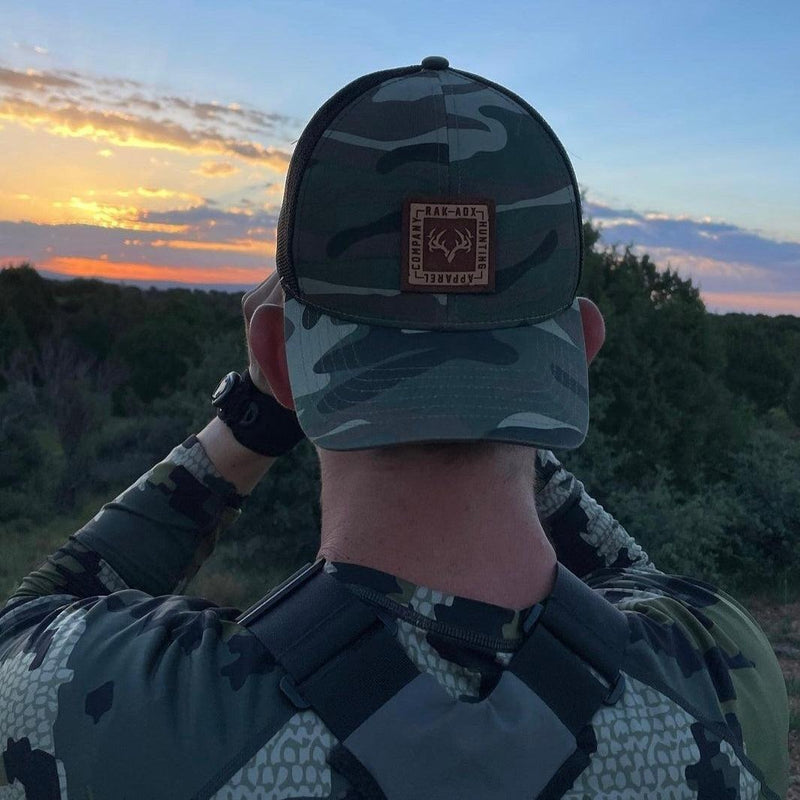 Load image into Gallery viewer, Delta Camo Leather Patch Trucker Hat
