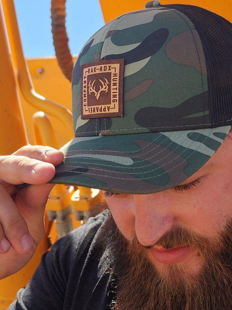 Load image into Gallery viewer, Delta Camo Leather Patch Trucker Hat
