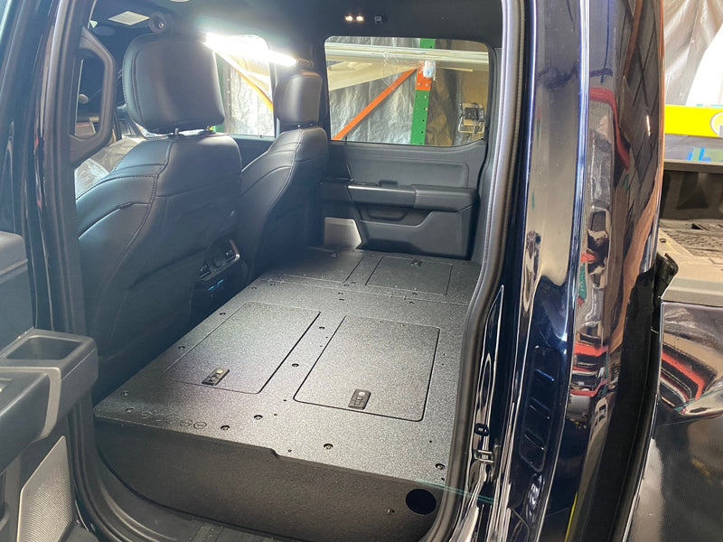 Load image into Gallery viewer, Ford - F150 2021-Present - 14th Gen. SuperCrew - Second Row Seat Delete Plate System with Factory B&amp;O Subwoofer Center Wall with Exterior Port
