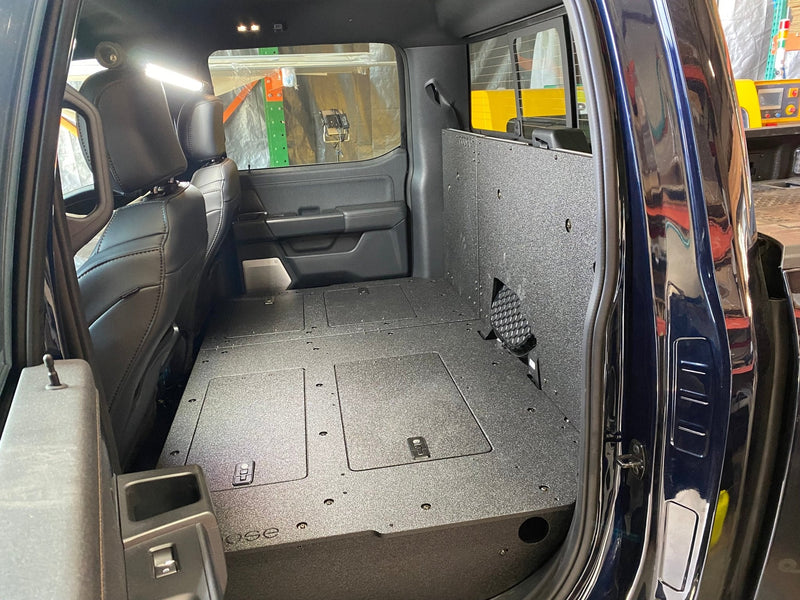 Load image into Gallery viewer, Ford - F150 2021-Present - 14th Gen. SuperCrew - Second Row Seat Delete Plate System with Factory B&amp;O Subwoofer Center Wall with Exterior Port
