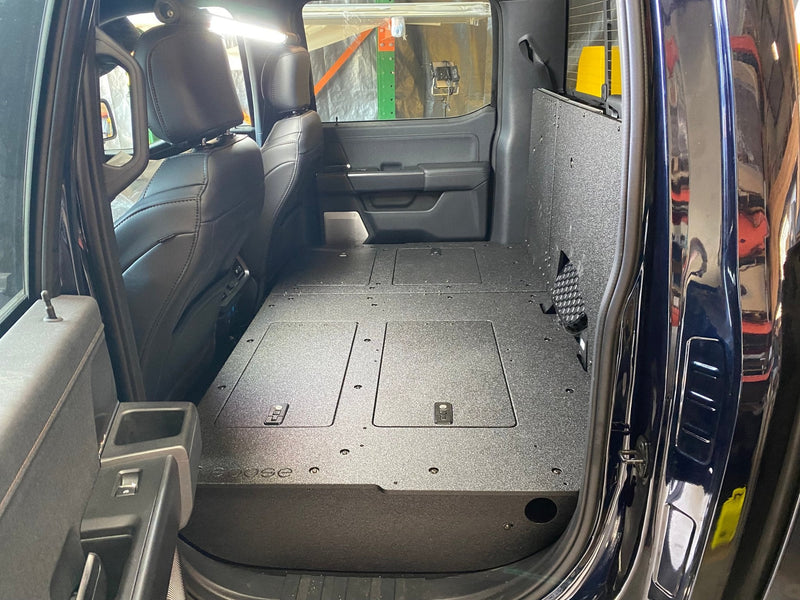 Load image into Gallery viewer, Ford Super Duty Ford - F250-F550 - 2023-Present - 5th Gen. Crew Cab - Second Row Seat Delete Plate System with Factory B&amp;O Subwoofer Center Wall with Exterior Port
