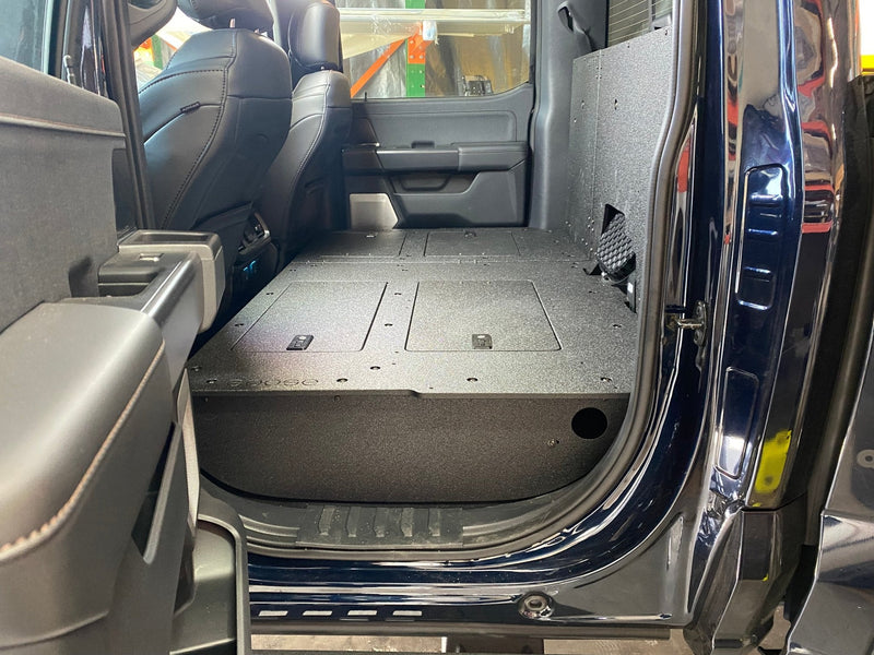 Load image into Gallery viewer, Ford Super Duty Ford - F250-F550 - 2023-Present - 5th Gen. Crew Cab - Second Row Seat Delete Plate System with Factory B&amp;O Subwoofer Center Wall with Exterior Port
