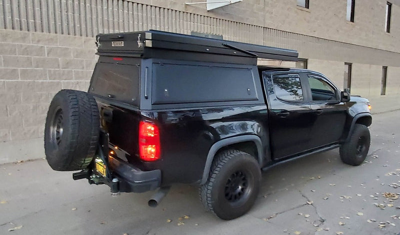 Load image into Gallery viewer, GAIA Campers Chevy Colorado / GMC Canyon Shortbed Camper - 2015+ (Downpayment)
