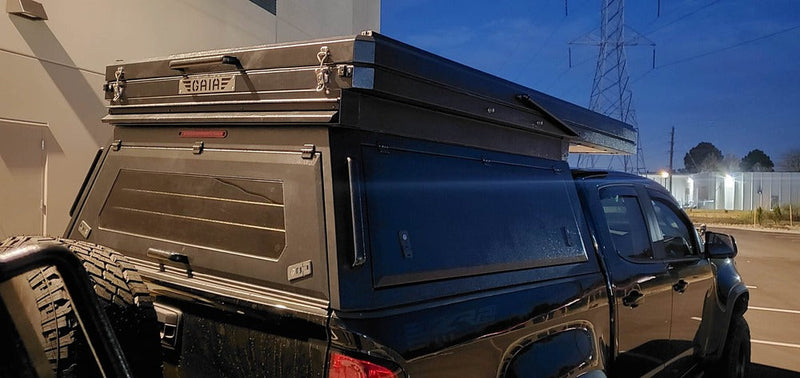 Load image into Gallery viewer, GAIA Campers Chevy Colorado / GMC Canyon Shortbed Camper - 2015+ (Downpayment)
