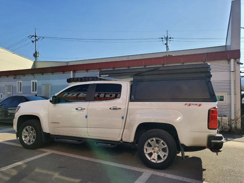 Load image into Gallery viewer, GAIA Campers Chevy Colorado / GMC Canyon Shortbed Camper - 2015+ (Downpayment)
