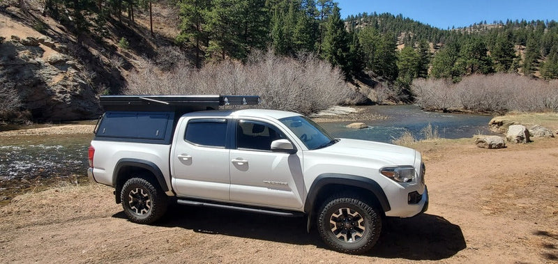 Load image into Gallery viewer, GAIA Campers 3rd Gen Toyota Tacoma Shortbed Camper - 2016+ (Downpayment)

