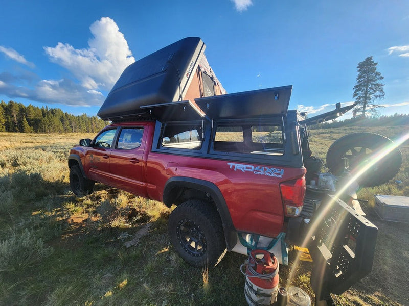 Load image into Gallery viewer, GAIA Campers 3rd Gen Toyota Tacoma Longbed Truck Cap - 2016+ (Downpayment)
