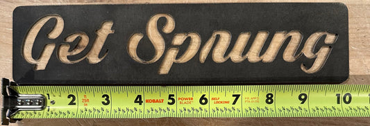 The GET SPRUNG STEEL sign cut out. The AR-TT
