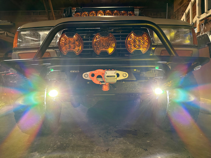 Load image into Gallery viewer, Toyota FJ80 Landcruiser Steerable Knuckle Pod Light Mounts (1990-1997)
