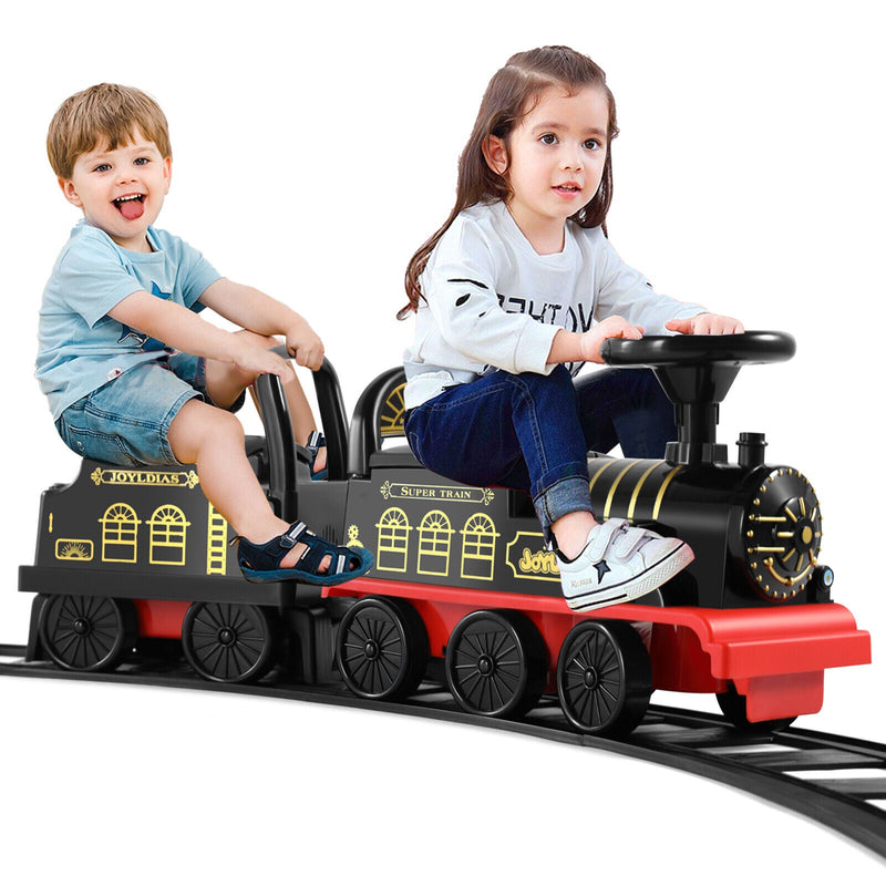 Load image into Gallery viewer, Interactive 6V Electric Kids Train Set with Track, Carriage, Lights, Whistle, Music, Storytelling, and Storage
