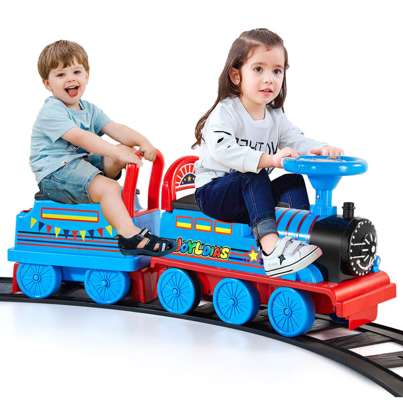 Load image into Gallery viewer, Interactive 6V Electric Kids Train Set with Track, Carriage, Lights, Whistle, Music, Storytelling, and Storage
