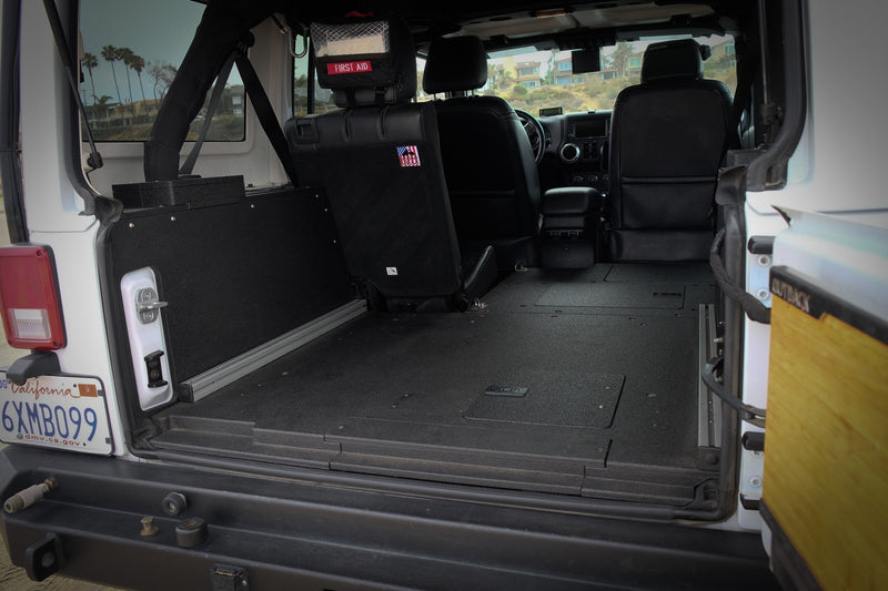 Load image into Gallery viewer, Legacy Product - Jeep Wrangler 2007-2018 JKU 4 Door - Second Row Seat Delete Plate System
