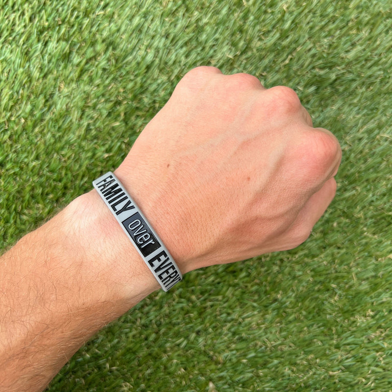 Load image into Gallery viewer, FAMILY OVER EVERYTHING Wristband
