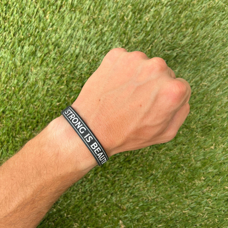 Load image into Gallery viewer, STRONG IS BEAUTIFUL Wristband
