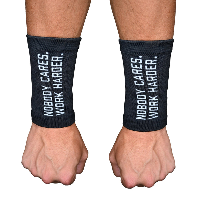 Load image into Gallery viewer, Nobody Cares. Work Harder. Wrist Support Sleeves
